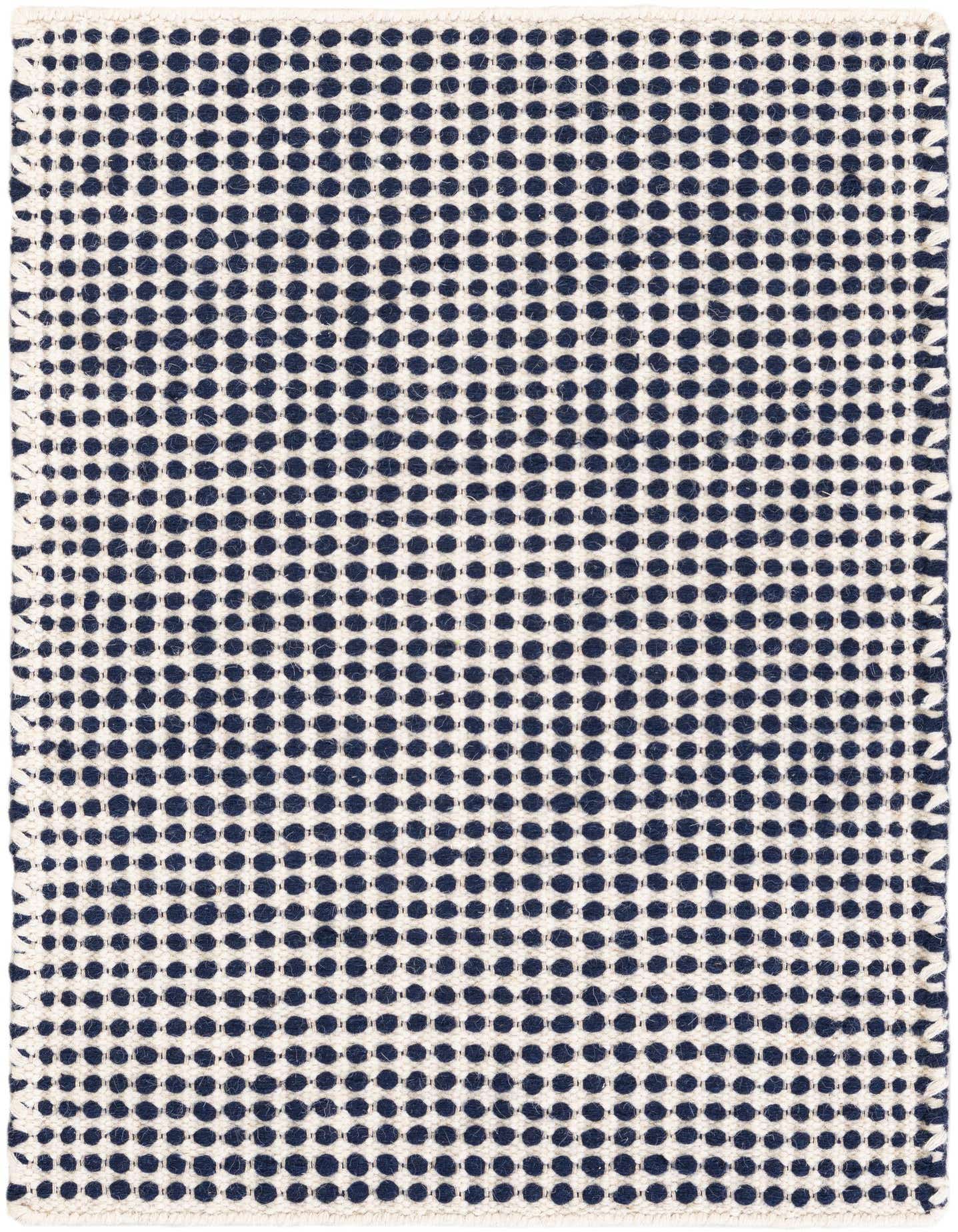 A 2x3 rectangular Rugs.com Seaside Pearl Jute rug with a modern abstract pattern of small navy blue dots on an ivory background.