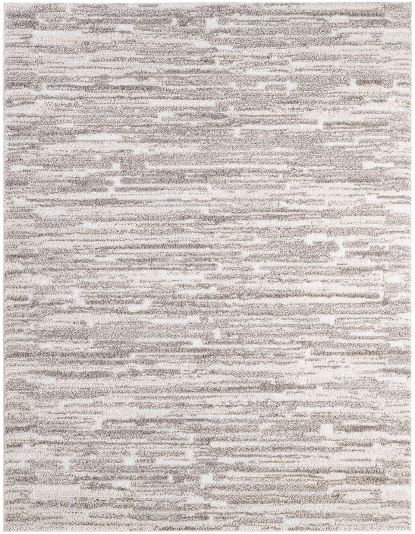 A 6x9 rectangular ivory and cream area rug with a modern abstract pattern of horizontal textured lines, suitable for a living room.