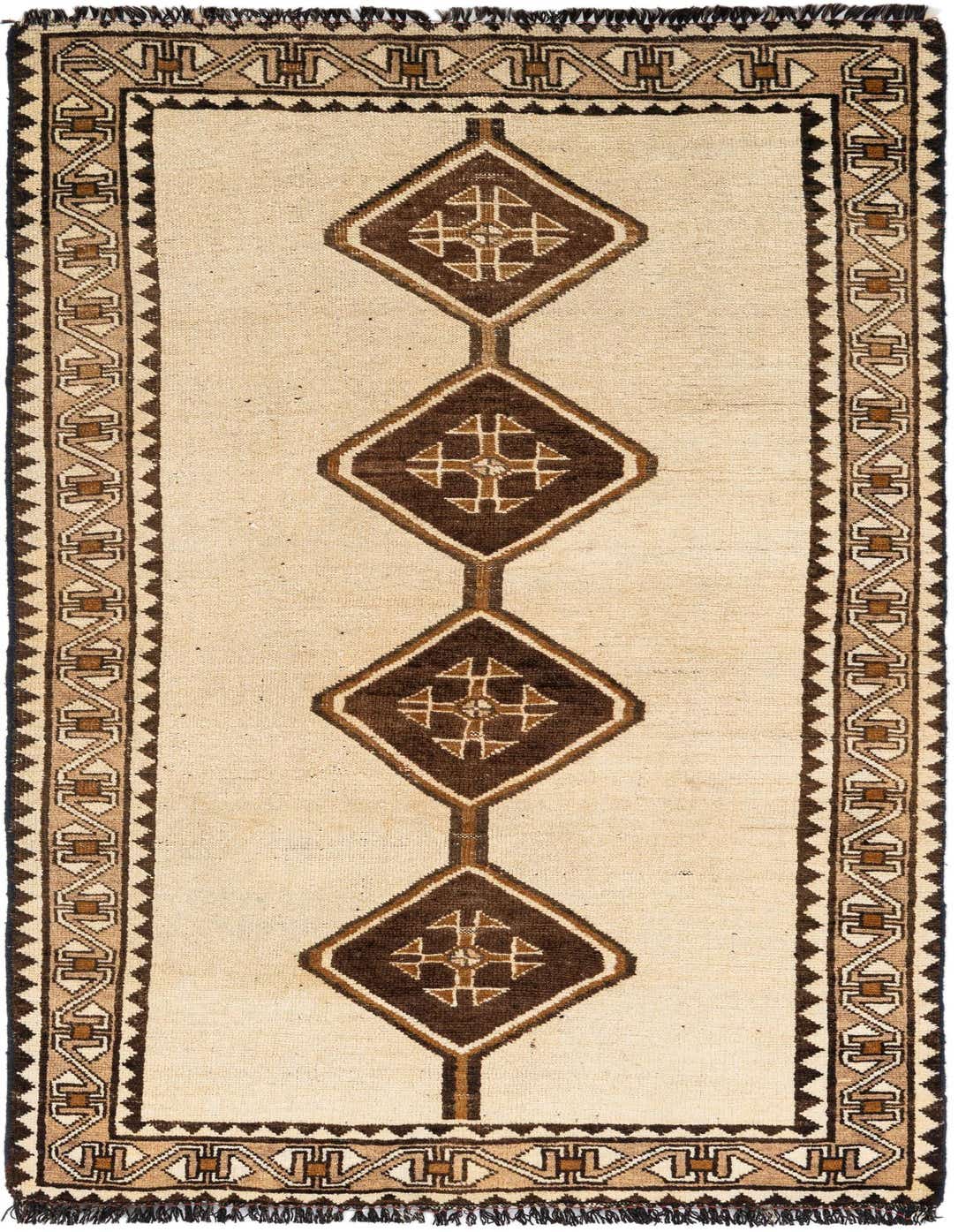 A 4x6 rectangular ivory wool rug with a central column of four large brown diamond motifs, bordered by intricate geometric patterns.