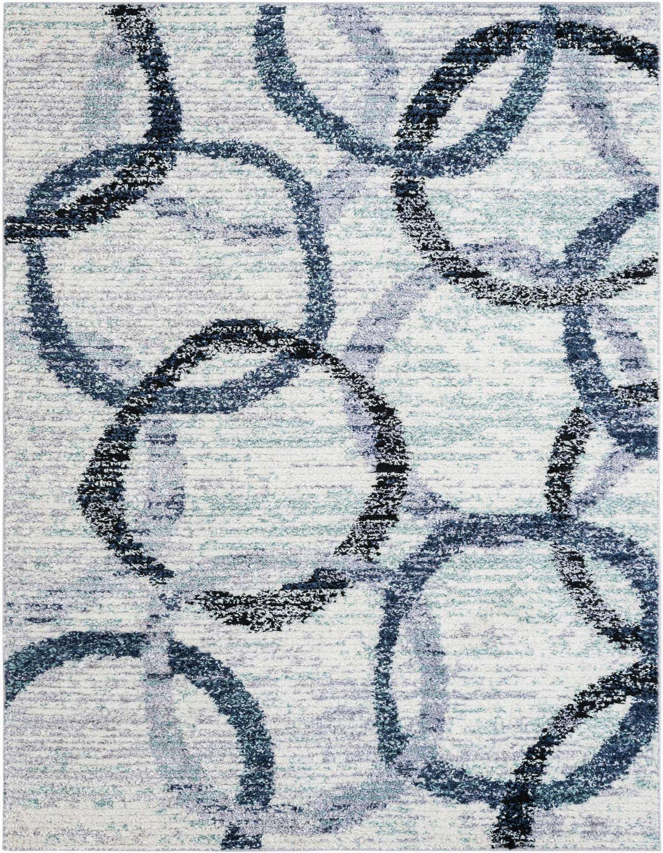 A 6x9 rectangular ivory shag rug with an abstract modern pattern of interlocking blue, black, and gray circles.