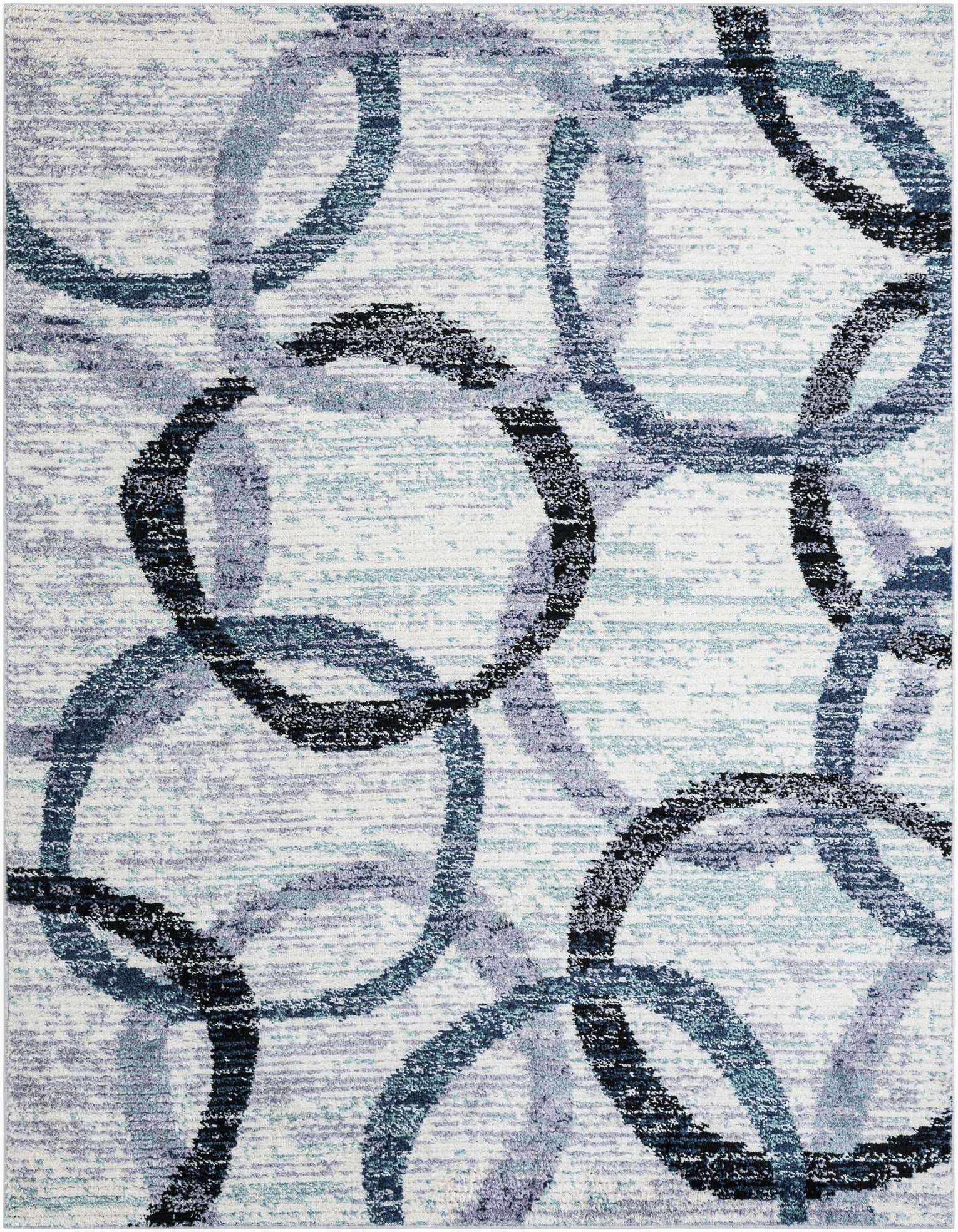 An 8x10 rectangular ivory shag rug with an abstract pattern of overlapping blue, gray, and black circles.