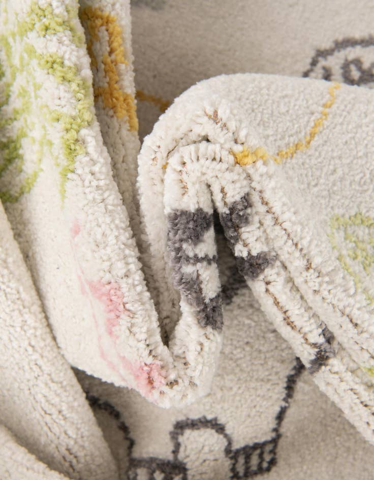 Detail image of  3' 11 x 5' 11 Dinosaur Whimsy Kids Rug