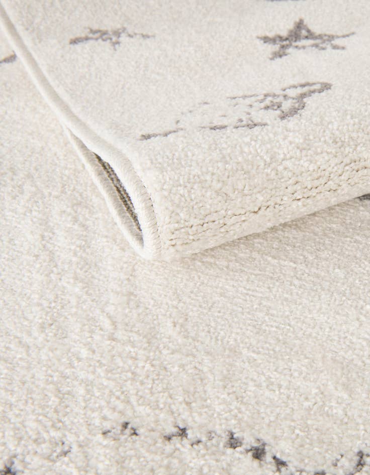 Detail image of  3' 11 x 5' 11 Planets Whimsy Kids Rug