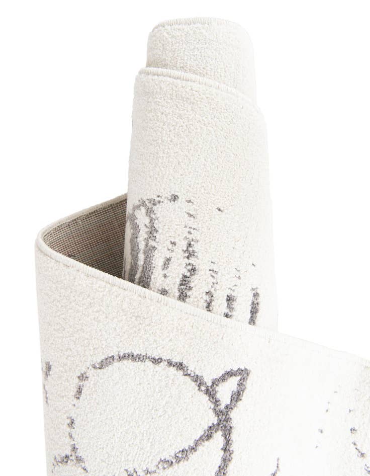 Detail image of  3' 11 x 5' 11 Planets Whimsy Kids Rug