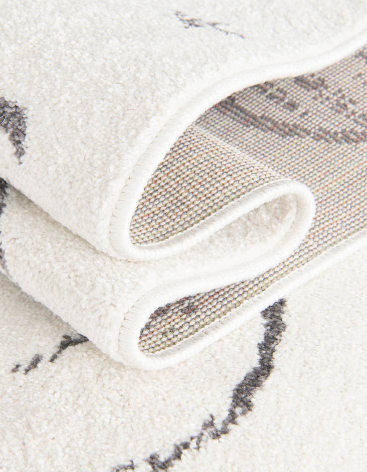 Detail image of  3' 11 x 5' 11 Planets Whimsy Kids Rug