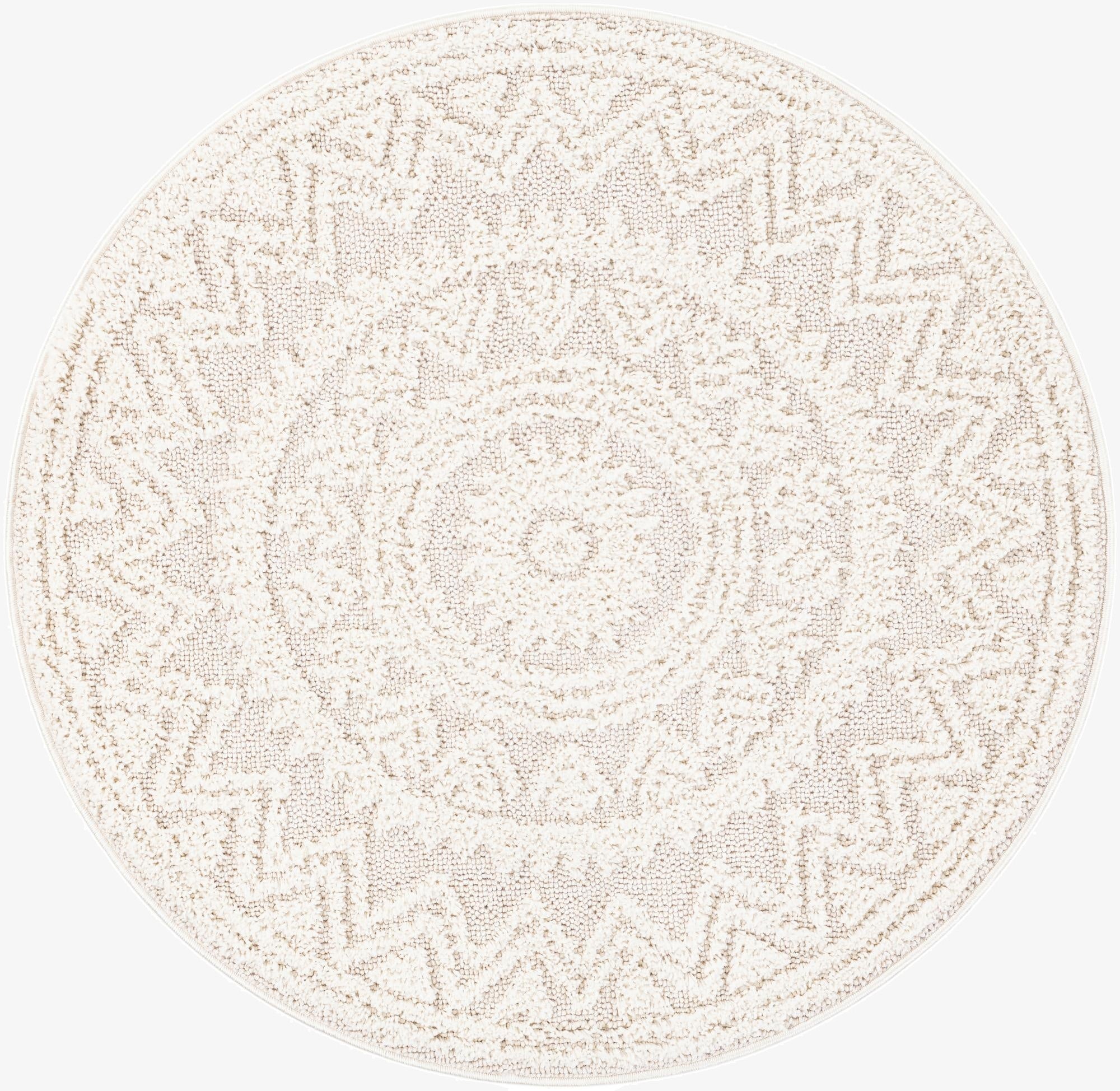 A round ivory and cream rug with a textured modern geometric pattern, suitable for various indoor spaces.