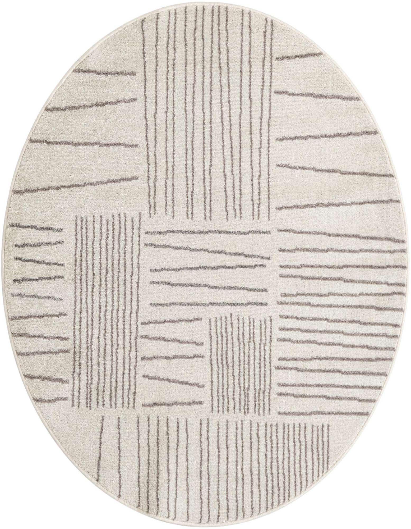 A round ivory and cream rug with a modern abstract pattern of short, textured gray lines arranged in horizontal and vertical blocks.