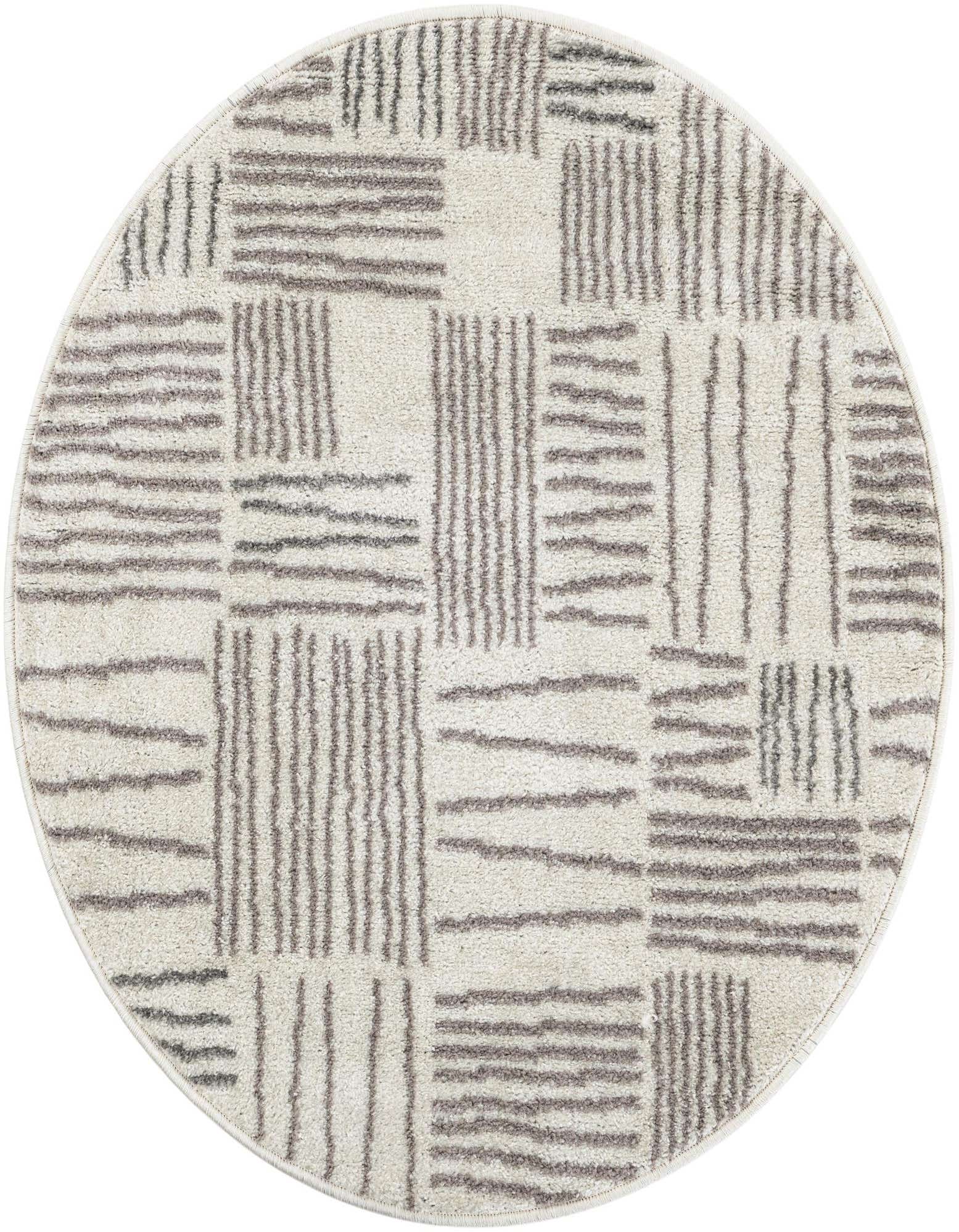 A round 3' 0 x 3' 0 ivory and cream rug with a modern abstract pattern of short, irregular gray lines arranged in blocks.