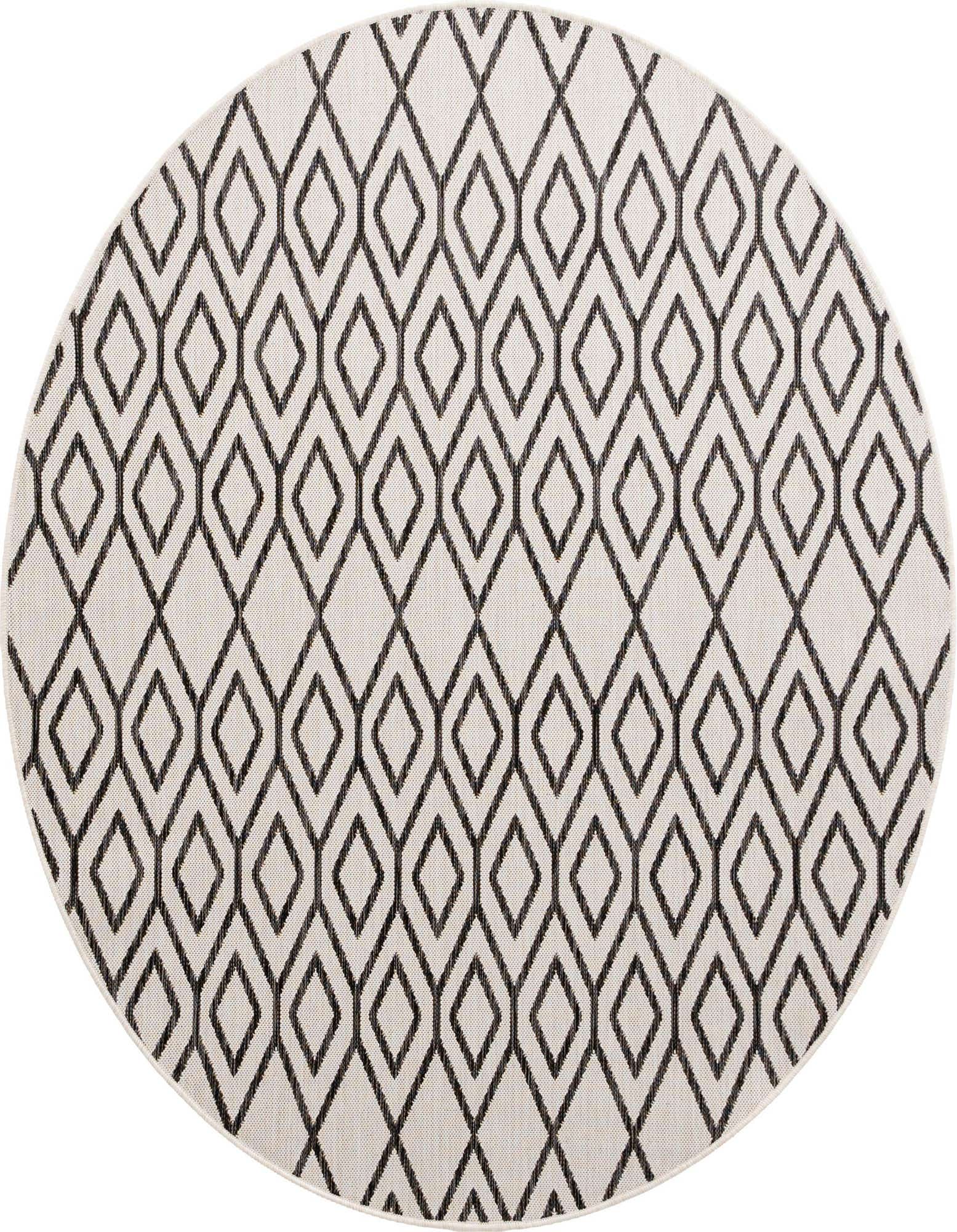 A round 6' 7 x 6' 7 Jill Zarin Outdoor rug featuring an ivory background with a repeating black tribal trellis pattern, ideal for a patio.