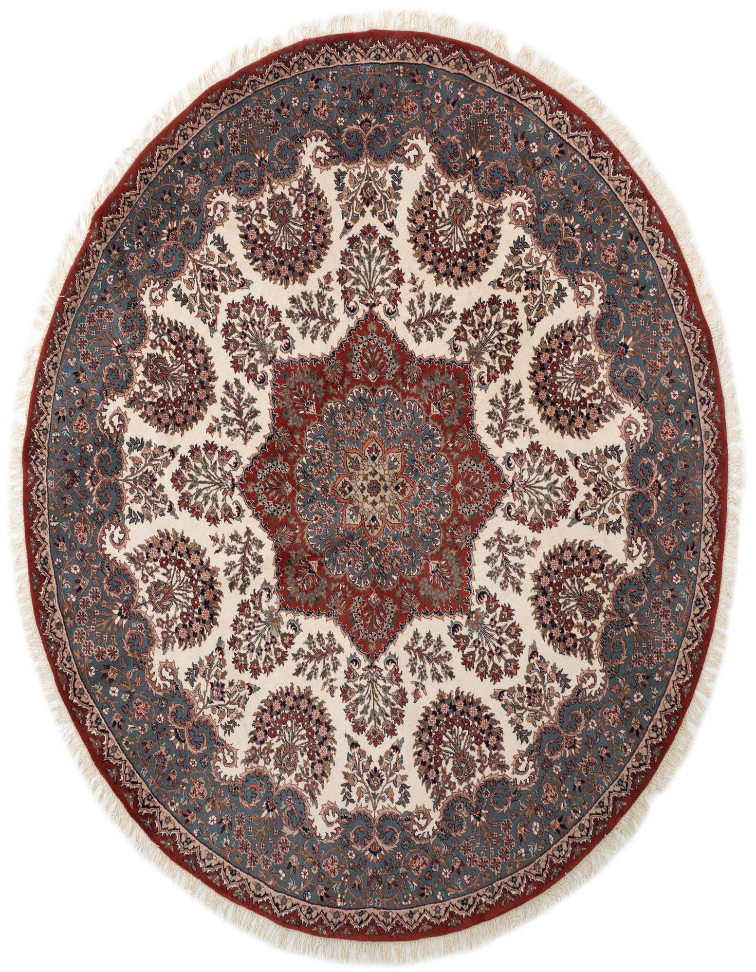 An 8' 10 round ivory wool rug with a traditional red medallion and blue-gray floral border.