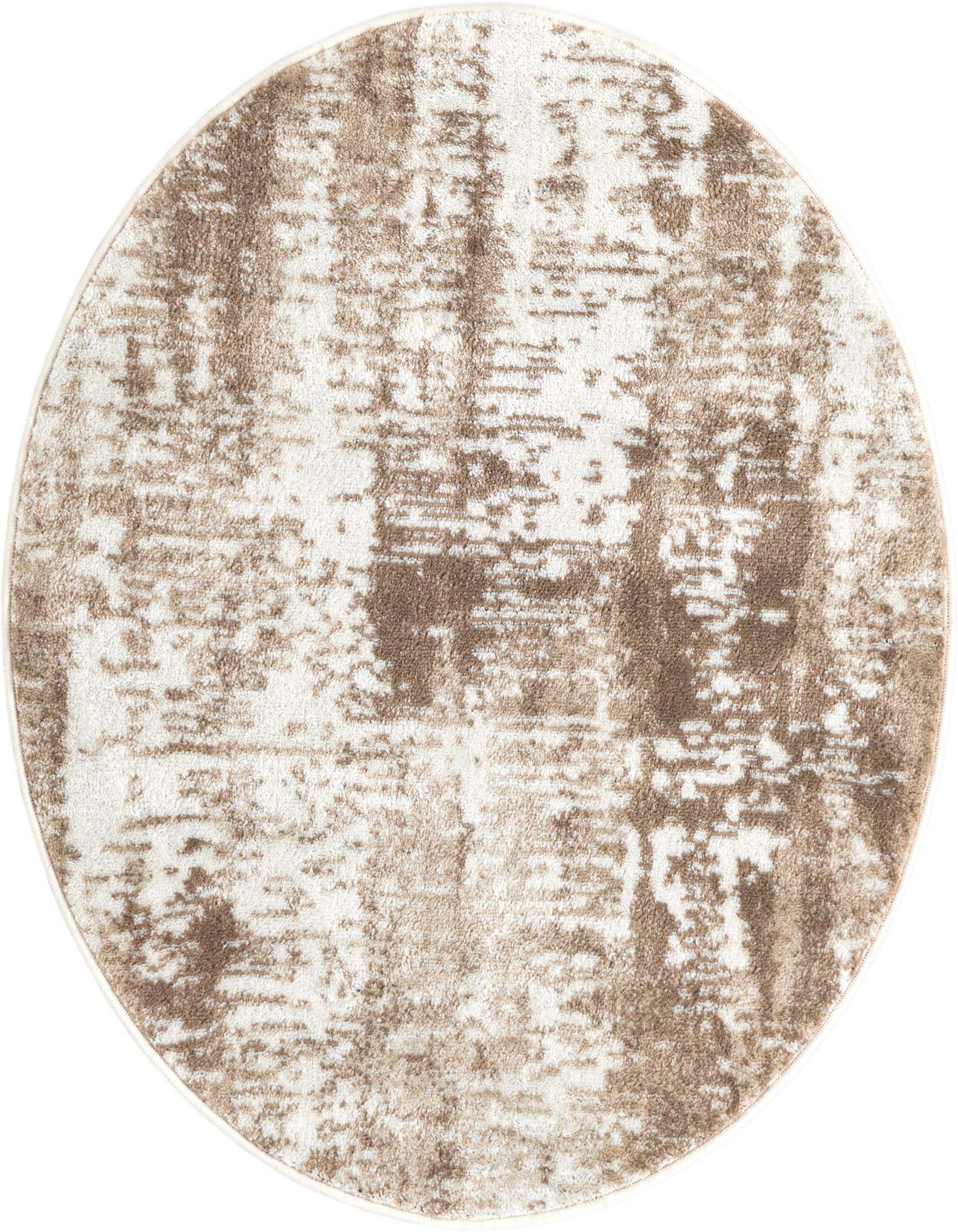 A 3' 1 round ivory and cream rug with a modern abstract pattern, suitable for indoor spaces.