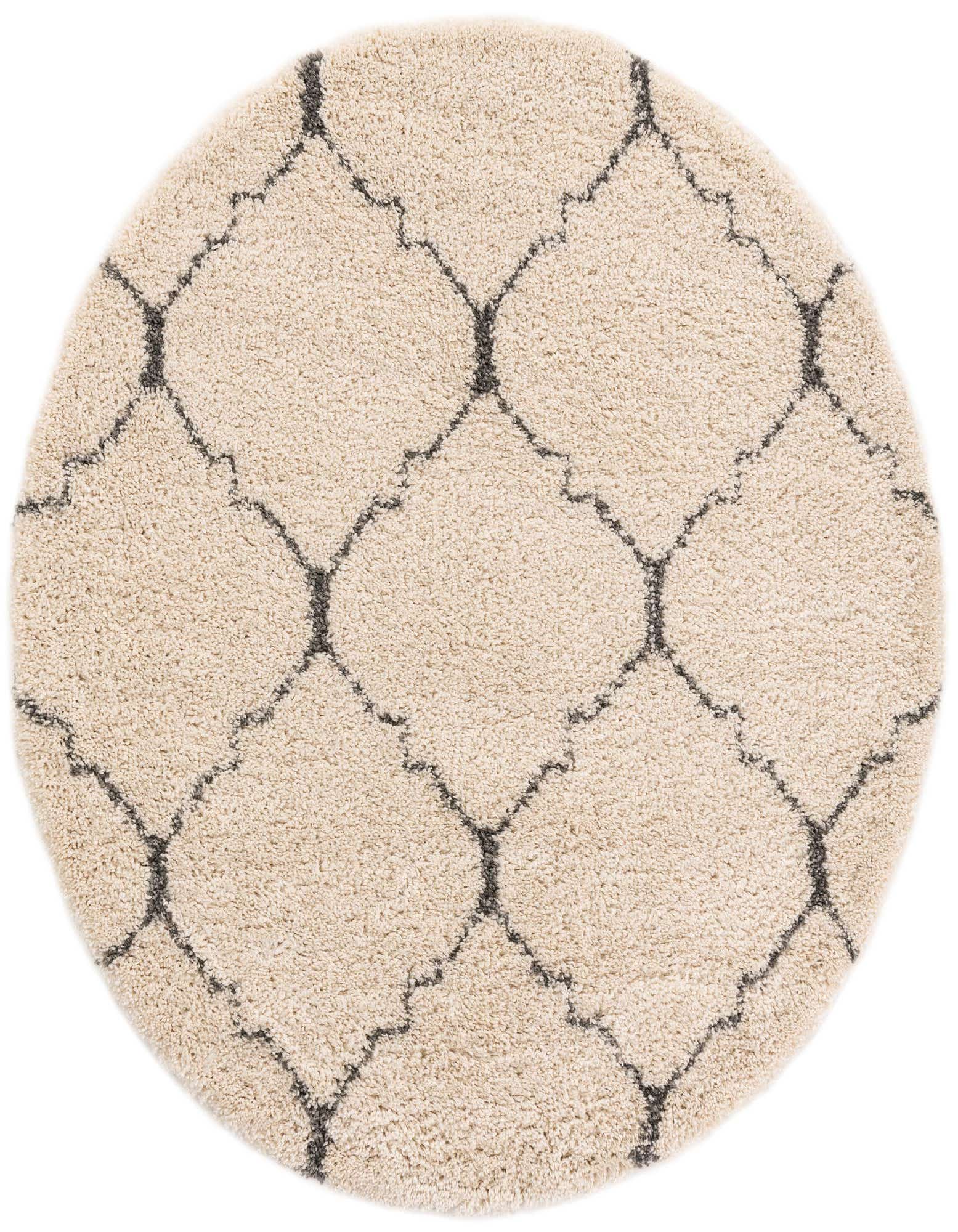 A round, cream-colored shag rug with a dark gray trellis pattern, offering a soft, textured feel.