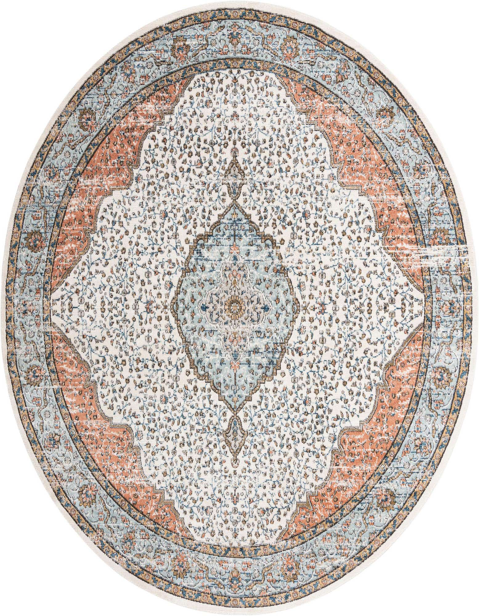 A 10-foot round ivory and cream rug with a distressed traditional medallion and floral pattern in blue and terracotta.