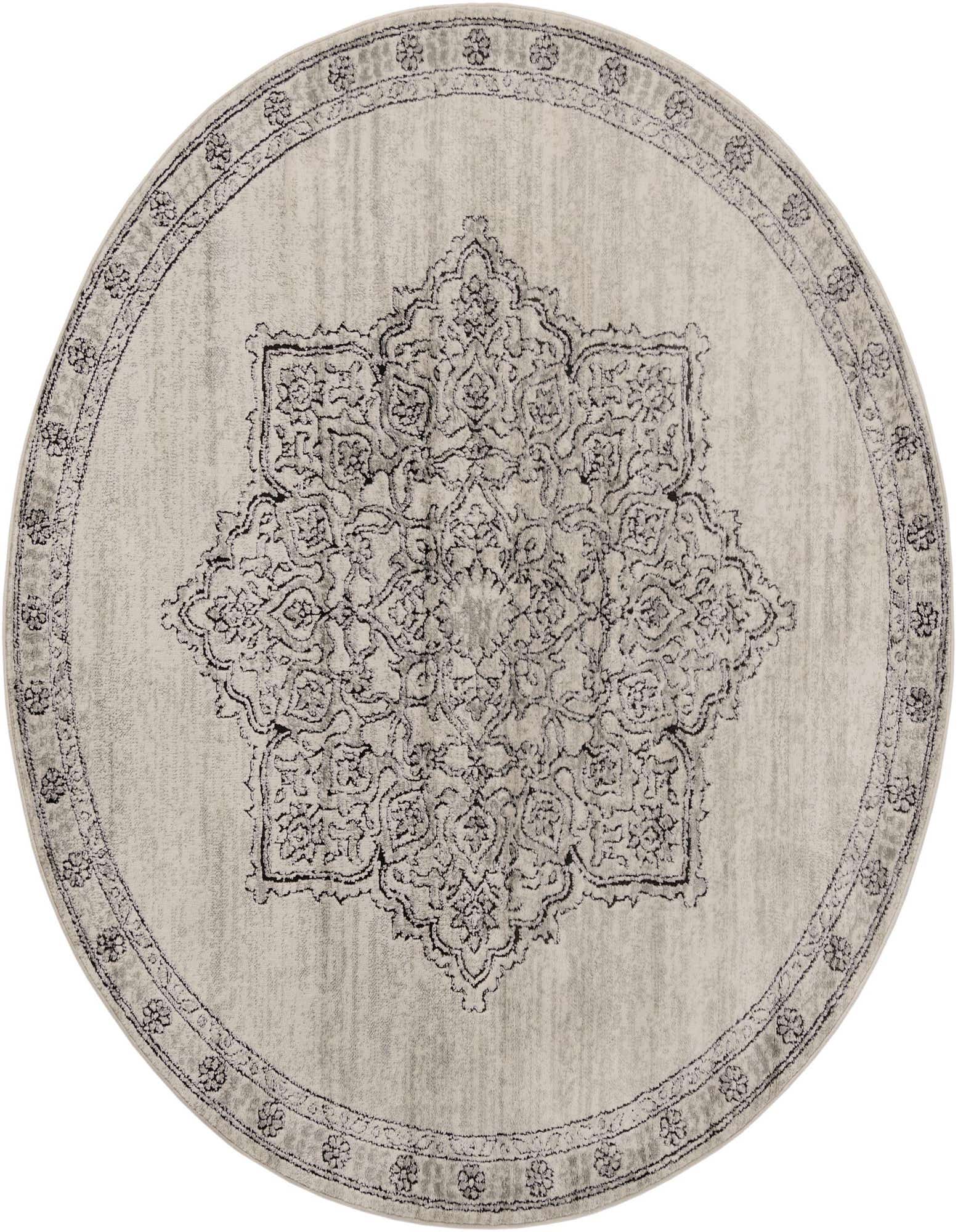 A 7' round ivory and cream traditional medallion rug with a textured pile, featuring a distressed vintage pattern.
