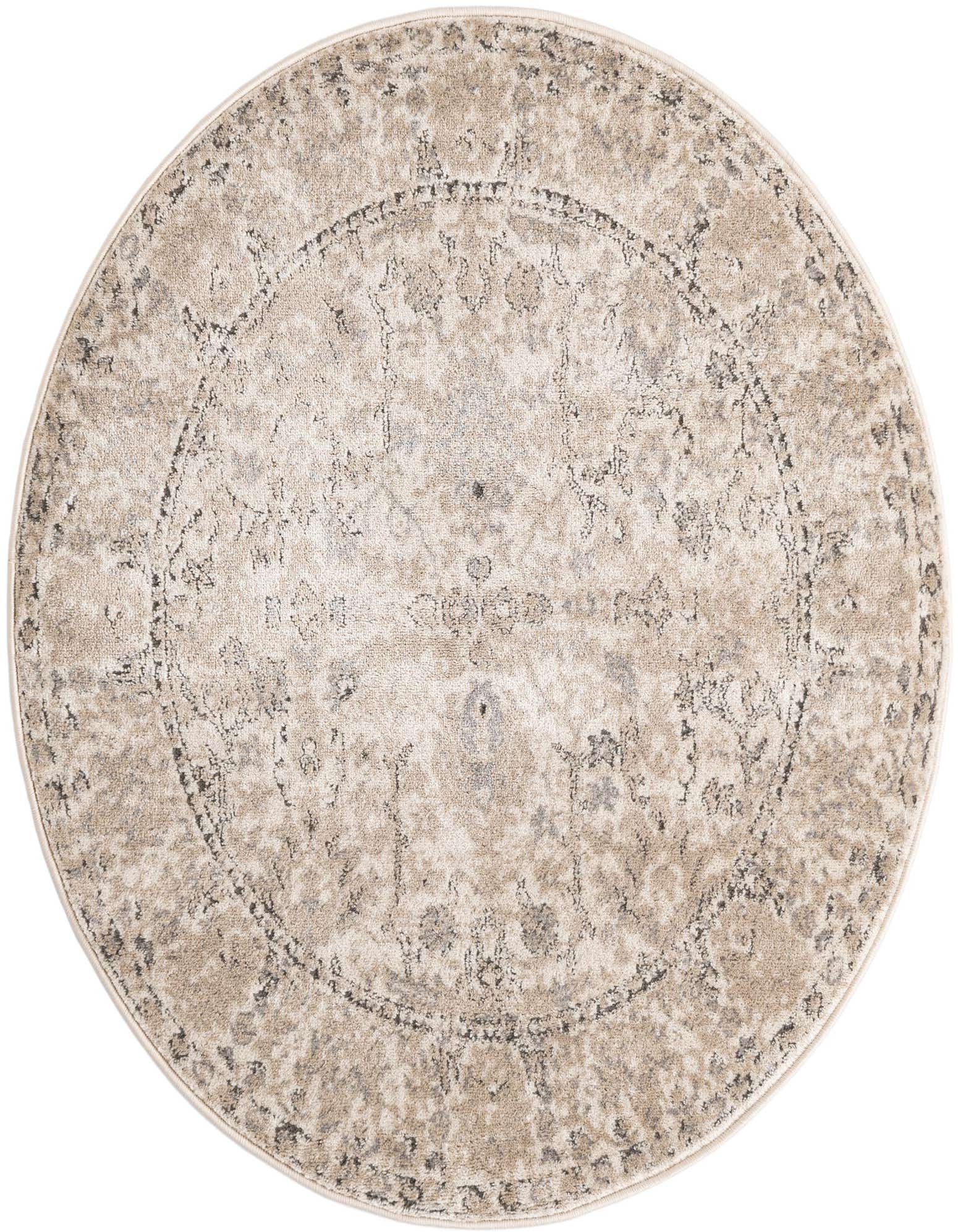 A round 4' 1" ivory and cream rug with a distressed traditional floral pattern and textured pile.