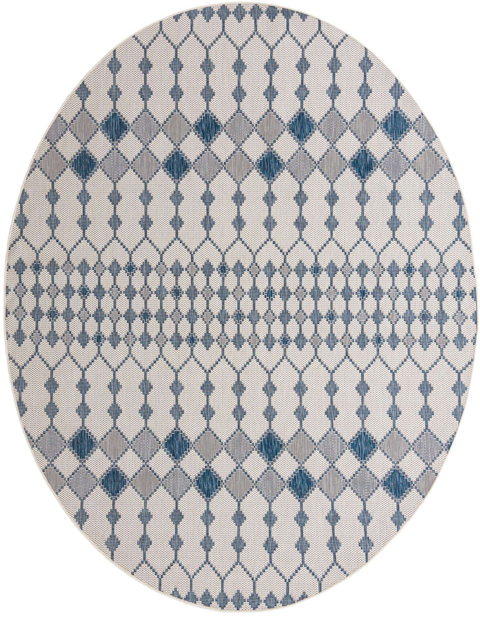 A 10-foot round ivory and blue outdoor rug with a modern trellis pattern, ideal for a patio.