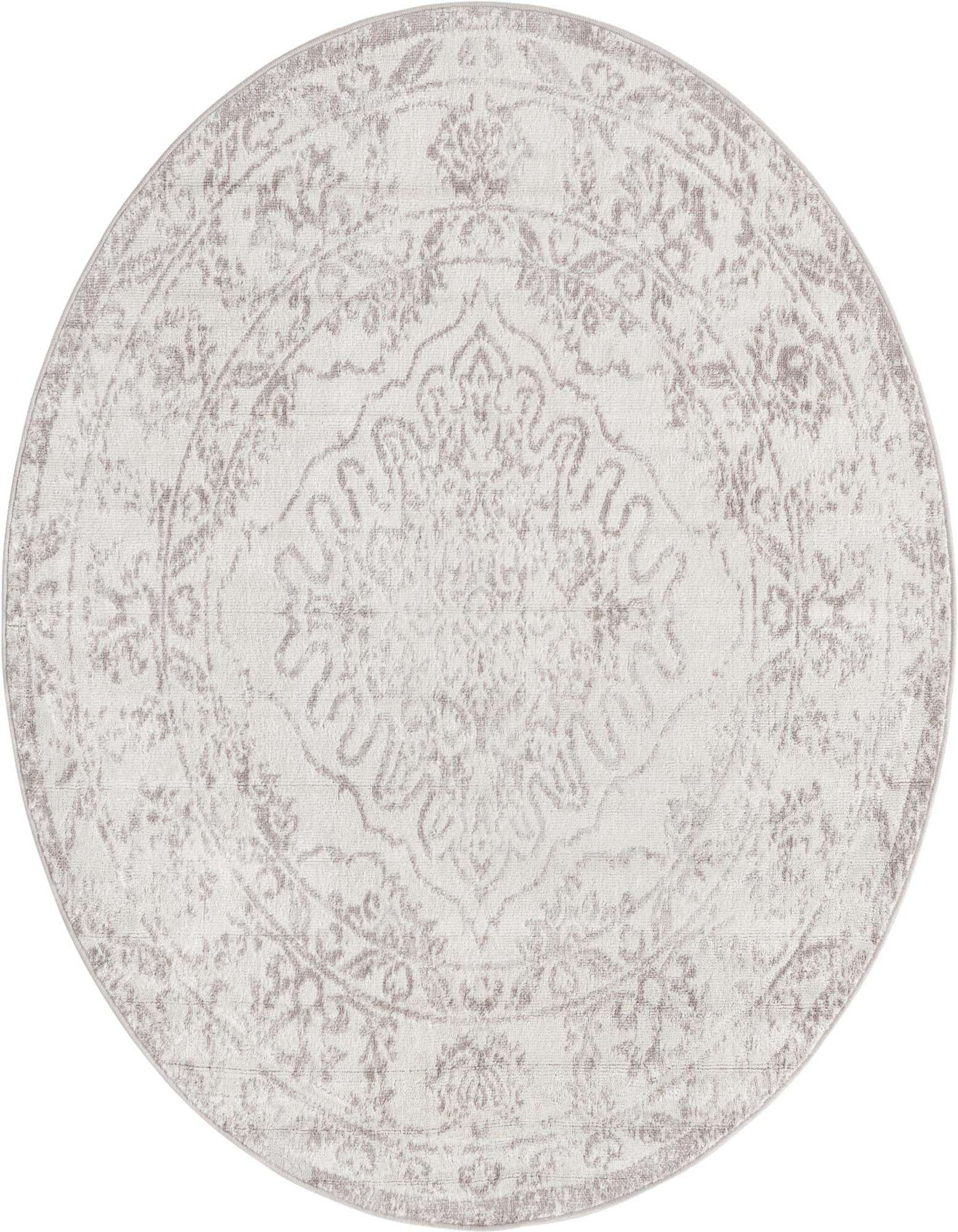 A 5' 3 round ivory and cream rug with a faded traditional medallion pattern, ideal for indoor spaces.
