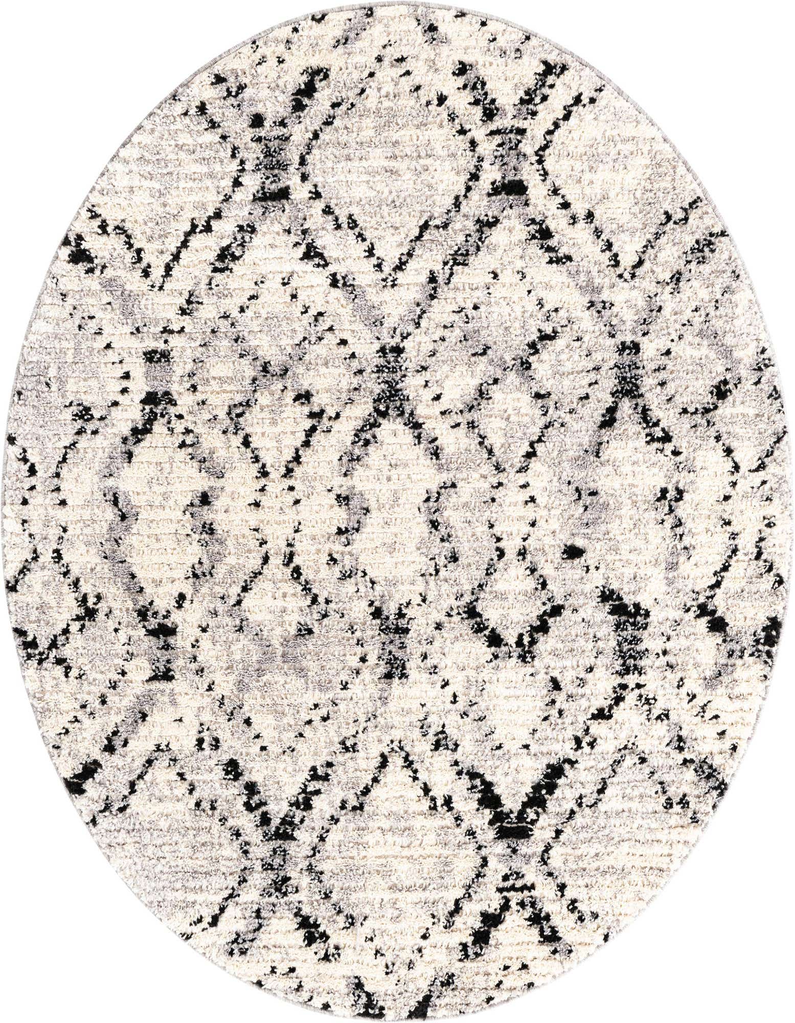 A round ivory and black shag rug with a modern striped pattern, perfect for adding texture to any indoor space.