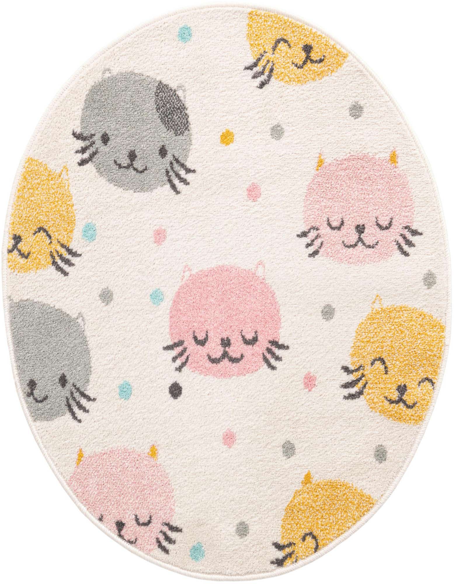 Round ivory rug with playful pink, yellow, and gray cat faces and colorful polka dots, perfect for a child's room.