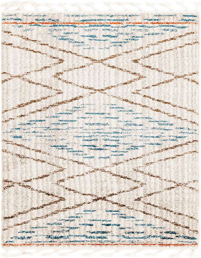 A close-up of the Aramis 6 Ft Runner rug, featuring a high pile ivory and cream base with blue, brown, and orange modern stripe patterns, and decorative tassels.