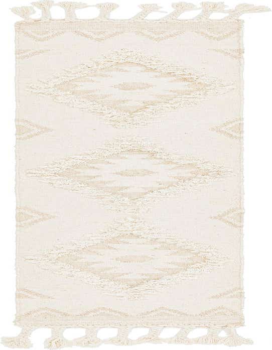An 8 ft ivory wool runner rug with a bohemian tribal pattern and decorative tassels, perfect for a hallway.