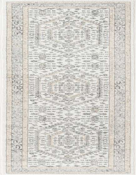 A 12 ft ivory runner rug with a traditional tribal medallion pattern in gray and beige, ideal for a hallway.