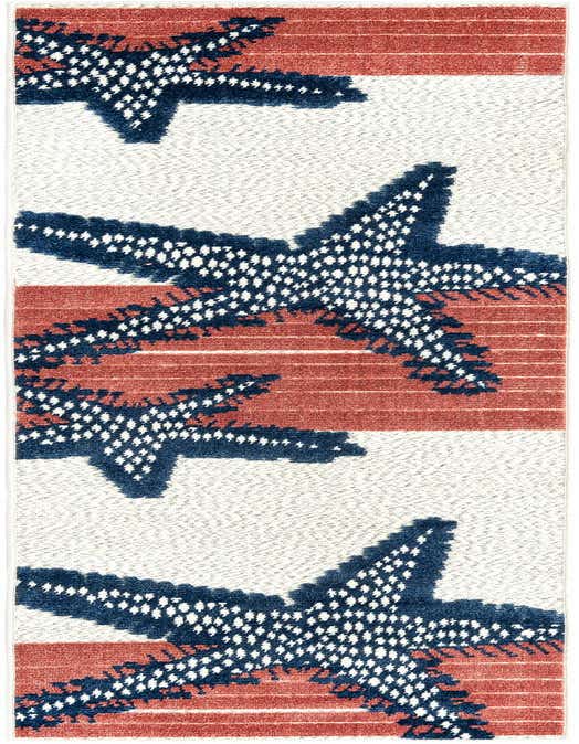 An 8 ft runner rug with a coastal design featuring large navy blue starfish against a background of white and terracotta stripes.