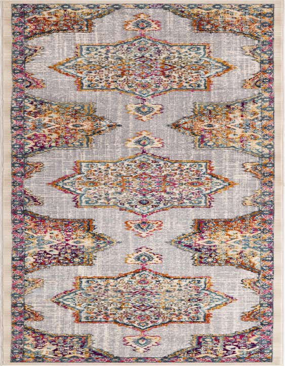 A 10 ft runner rug from the Budapest collection, featuring a bohemian medallion pattern in ivory, cream, and white with vibrant multicolor accents.