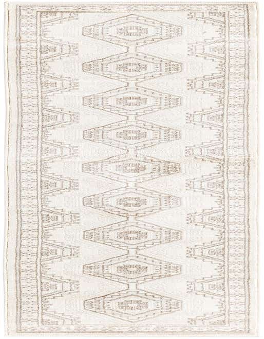 An 8 ft runner rug in ivory and cream with a traditional tribal pattern, ideal for a hallway or kitchen.