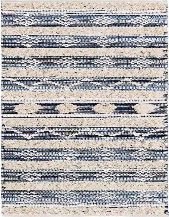 A 10 ft runner rug in a modern boho chic style, featuring textured stripes of ivory, cream, and blue.