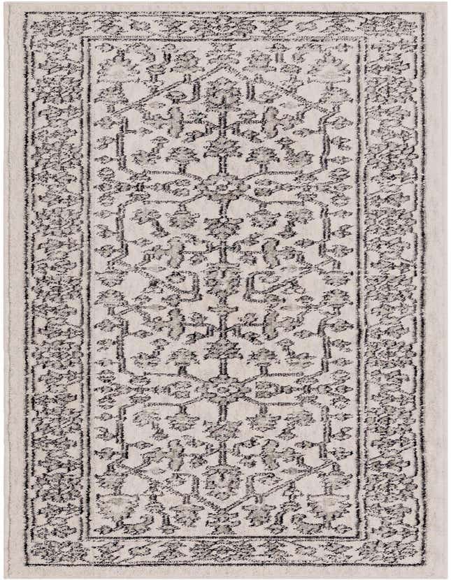 A 6 ft runner rug featuring an ivory background with a traditional trellis pattern in dark gray and light gray, perfect for a hallway or kitchen.