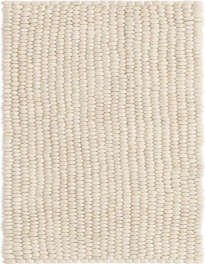 A 6 ft runner rug from the Felt Ball collection, featuring a textured ivory and cream shag pile made from individual wool felt balls.