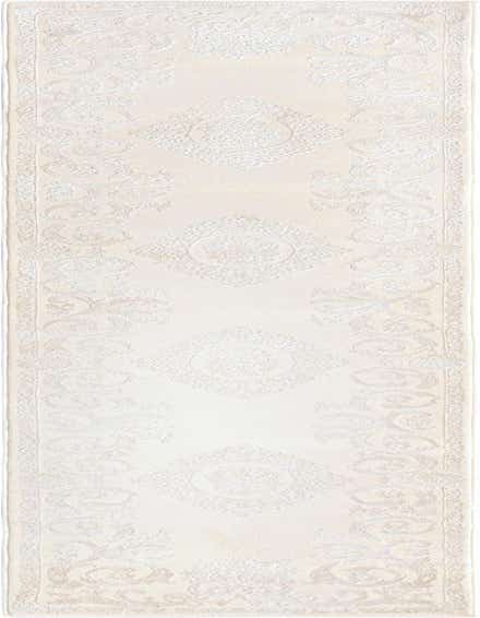 A 10 ft runner rug in ivory and cream with a textured traditional medallion pattern, ideal for a hallway.