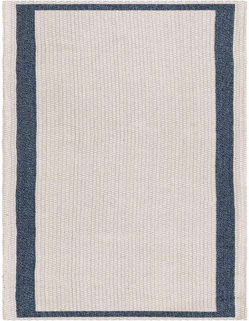 An 8 ft runner rug in ivory with a solid navy blue border, featuring a flatweave texture, ideal for hallways.
