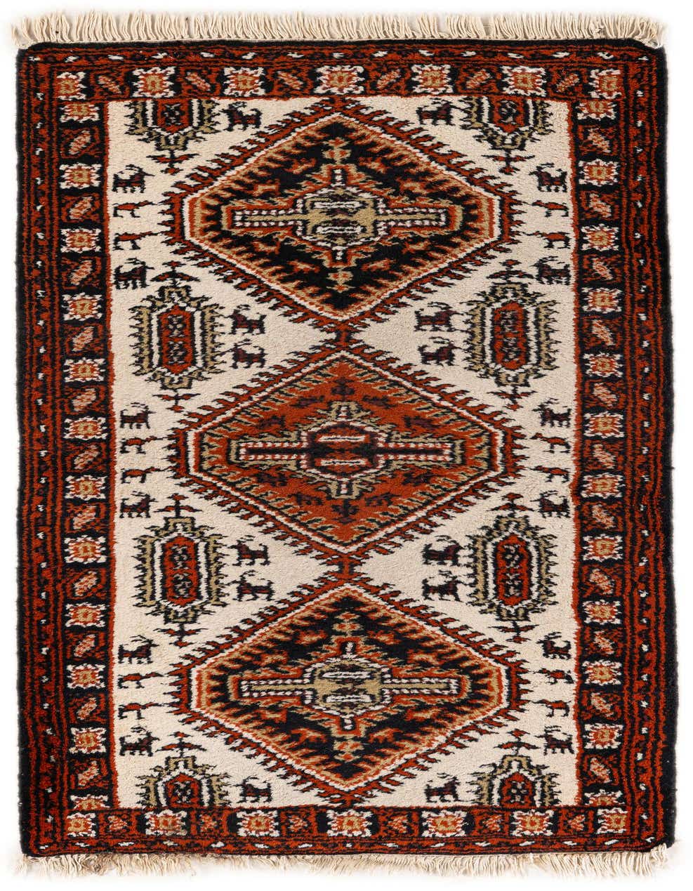 A 5 ft runner rug with a traditional Oriental pattern in ivory, cream, black, and rust, featuring geometric medallions and animal motifs.