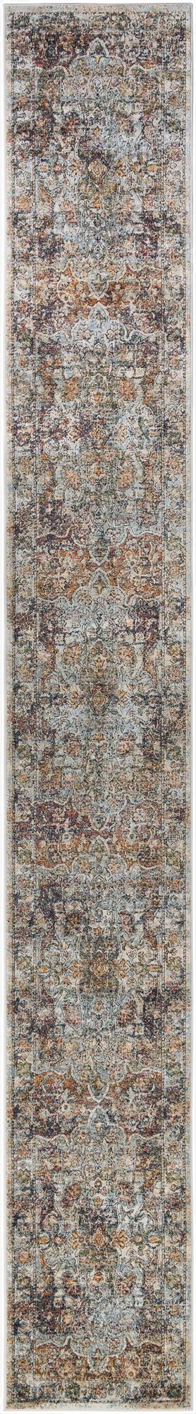 A 20 ft runner rug from the Isabella collection, featuring a distressed traditional medallion pattern in ivories, creams, and whites.