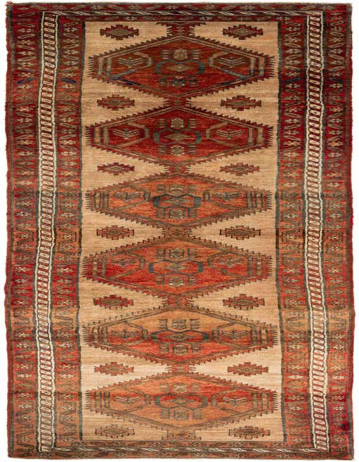 A long 14 ft runner rug in ivory and red with traditional Persian tribal patterns, ideal for a hallway.