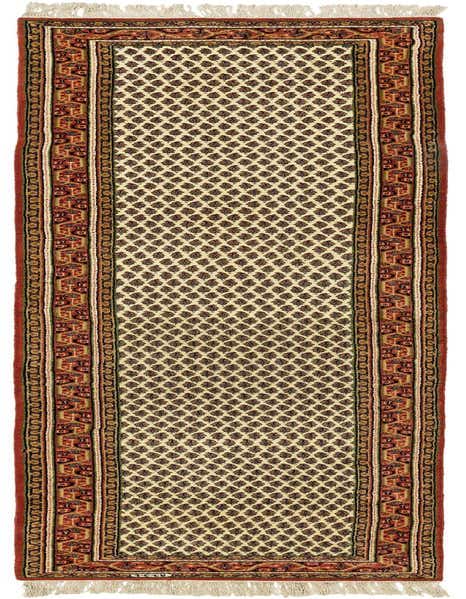 A long 11 ft ivory runner rug with a traditional Oriental pattern, featuring a central field of small brown motifs and a wide border in shades of red, brown, and gold, finished with white fringe.