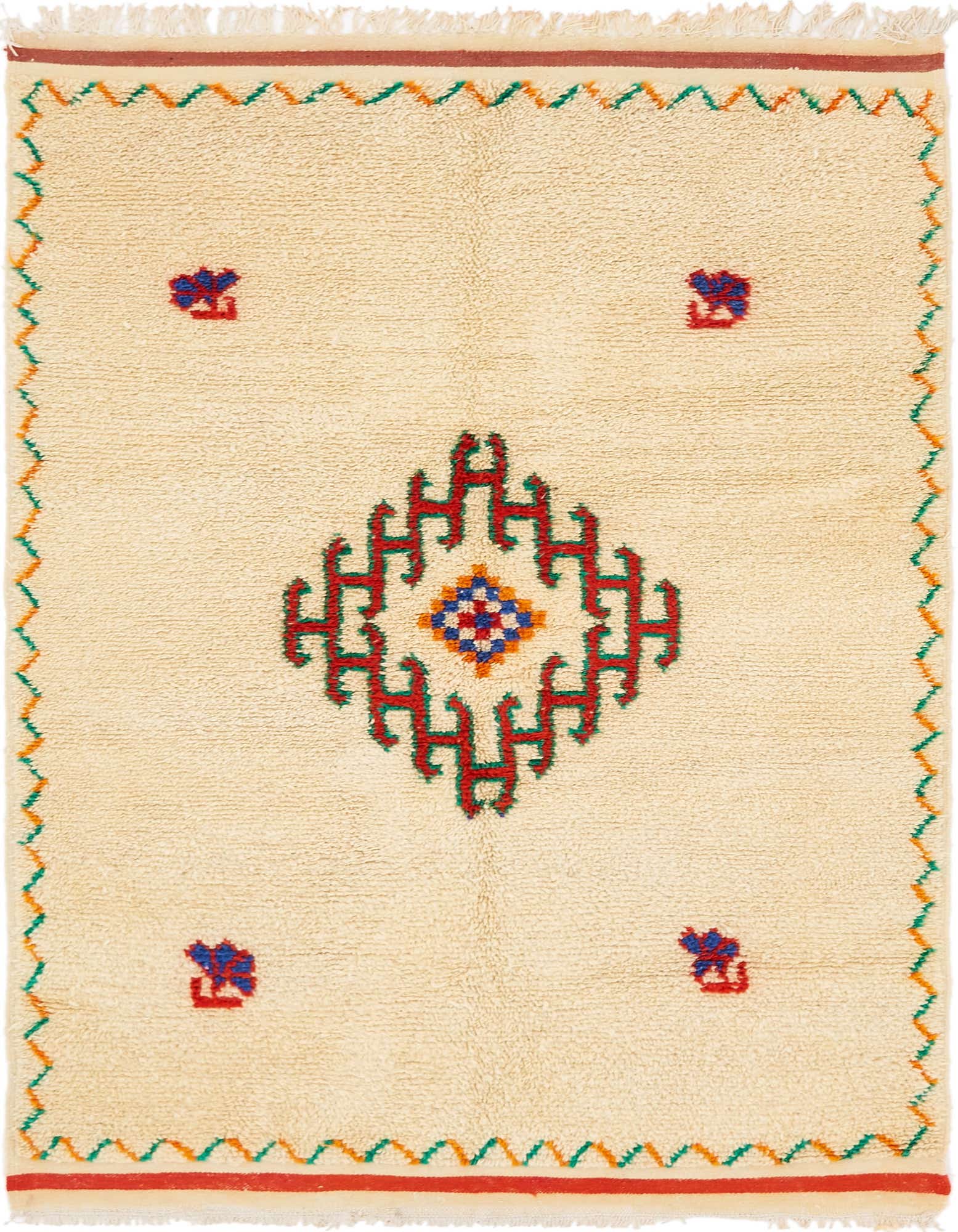 An 8 ft ivory runner rug with a central red, green, and blue tribal medallion, bordered by zig-zag patterns.