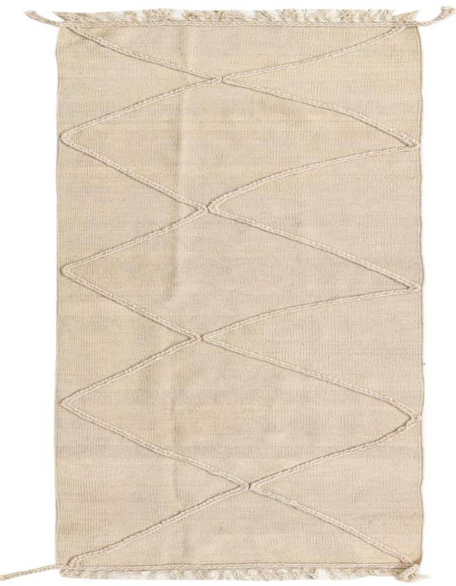 An 8 ft runner rug in ivory wool with a textured shag pile and braided diamond pattern, perfect for a hallway.