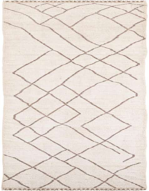 A 12 ft ivory runner rug with a shag pile and a modern tribal diamond pattern in brown, ideal for a hallway.