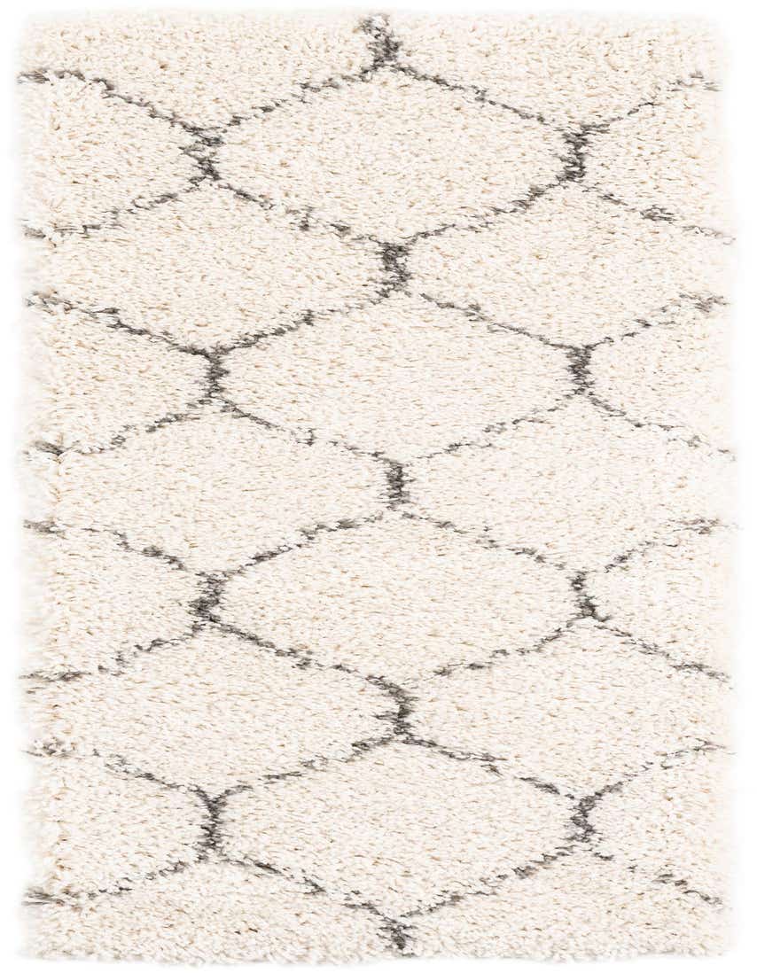 A soft ivory runner rug with a gray trellis pattern, ideal for a hallway, showcasing its plush shag pile.