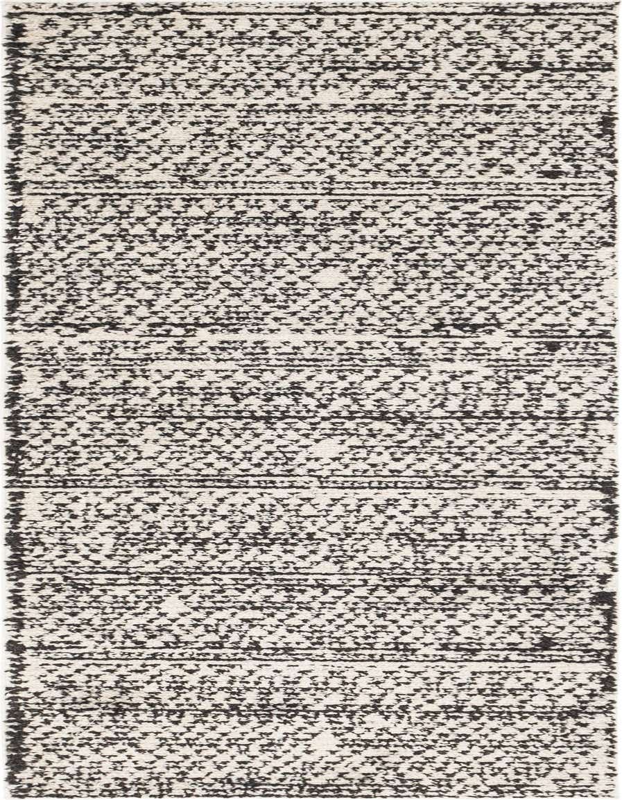 A 10 ft runner rug in ivory and black with a textured tribal pattern, ideal for a hallway.