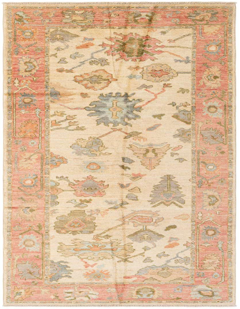 A 10 ft Oushak runner rug with an ivory field and a coral border, featuring a modern floral pattern in muted tones.