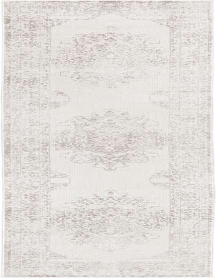 A 12 ft runner rug in ivory and cream with a distressed traditional medallion pattern, ideal for a hallway.