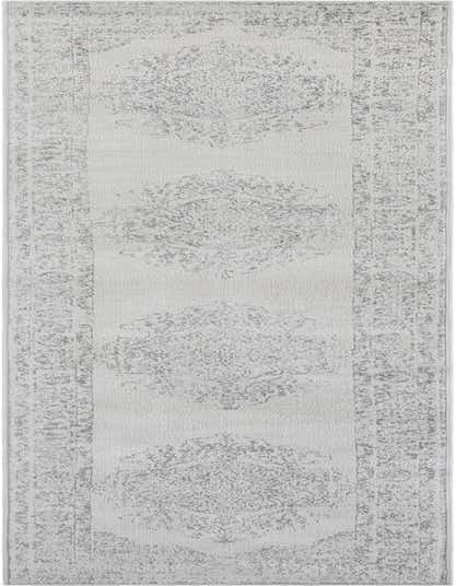 A 13 ft runner rug in shades of ivory and cream, featuring a distressed traditional medallion pattern, ideal for a hallway.