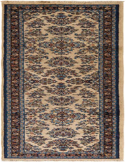 A 10 ft ivory runner rug with a traditional Oriental floral pattern in blue, brown, and cream, featuring a dark blue border.