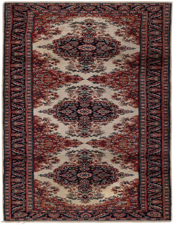 A 9 ft Sarough runner rug in ivory with a traditional oriental medallion pattern in red, navy, and cream.