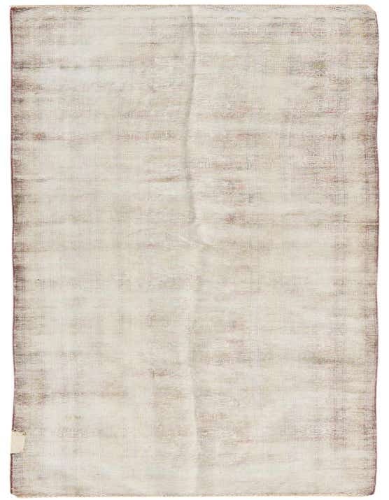 A 12 ft runner rug in ivory and cream with a faded Persian pattern, perfect for a hallway.