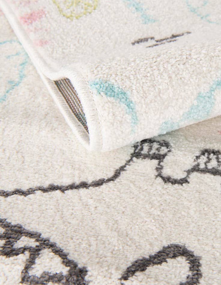 Detail image of  2' 2 x 3' 11 Dinosaur Whimsy Kids Runner Rug